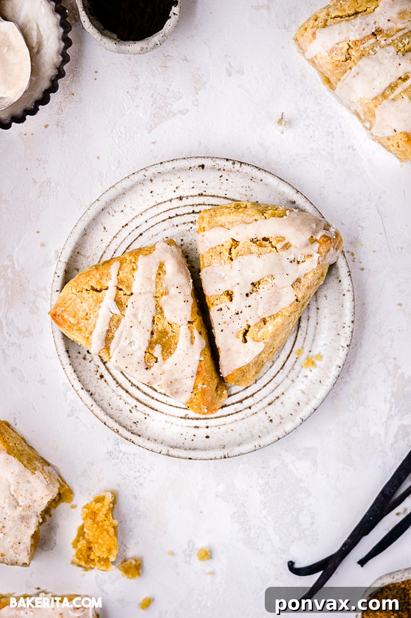 Delicious Gluten-Free Vegan Vanilla Scones, beautifully golden-brown and ready to be served, highlighting their inviting texture and vanilla bean flecks.