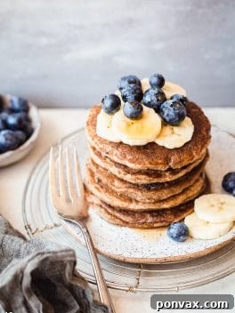 Fluffy Gluten-Free Vegan Banana Blueberry Pancakes.