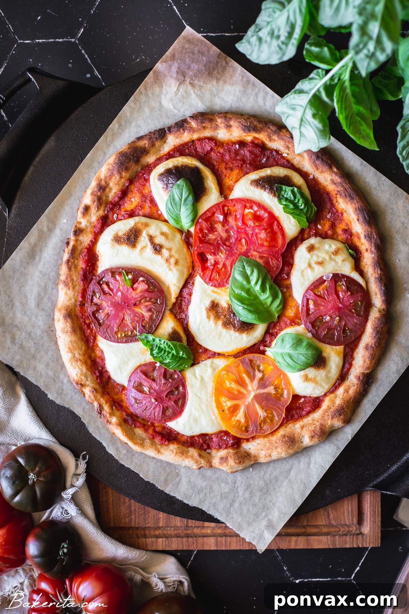 This Gluten-Free Sourdough Pizza Crust requires just six ingredients, 10 minutes, and one bowl needed to mix up the dough! This easy sourdough discard pizza dough recipe is also vegan, and couldn't be easier to make.
