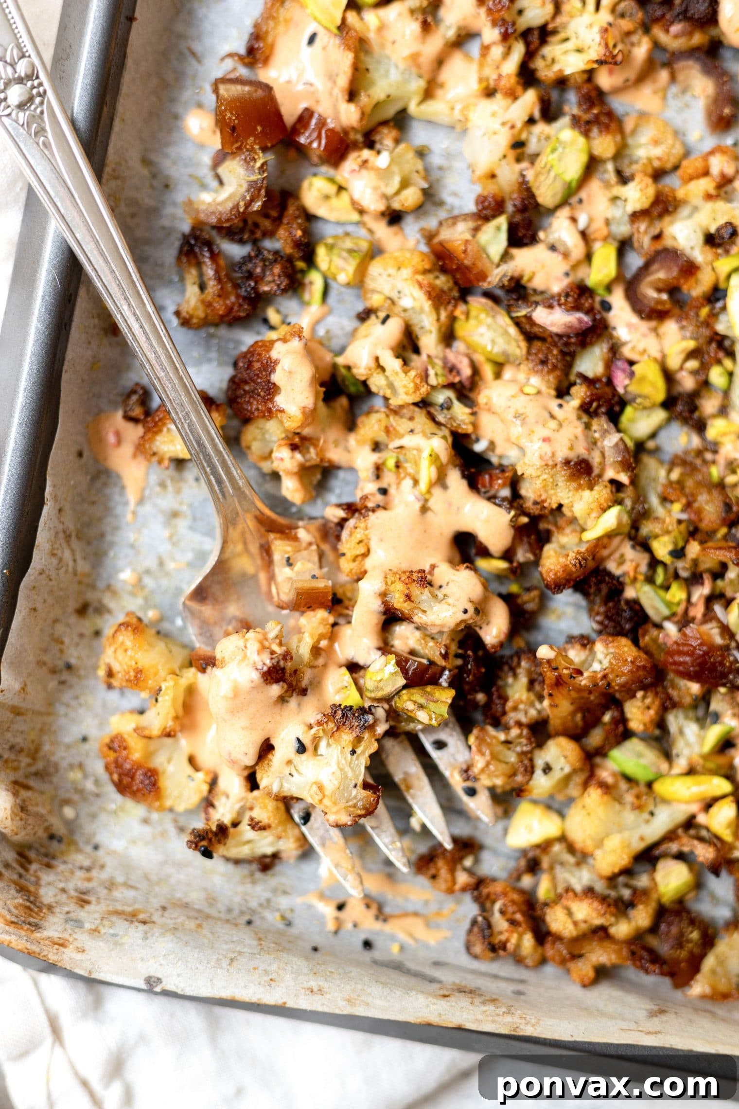 Golden Charred Cauliflower with Zesty Tahini Drizzle 5 Roasted cauliflower florets with some charred edges