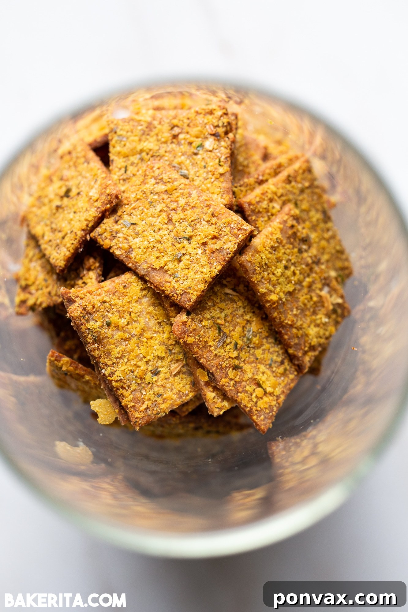 Artisan Gluten-Free Sourdough Crisps 5 Stacked gluten-free sourdough crackers, perfectly golden and crispy.