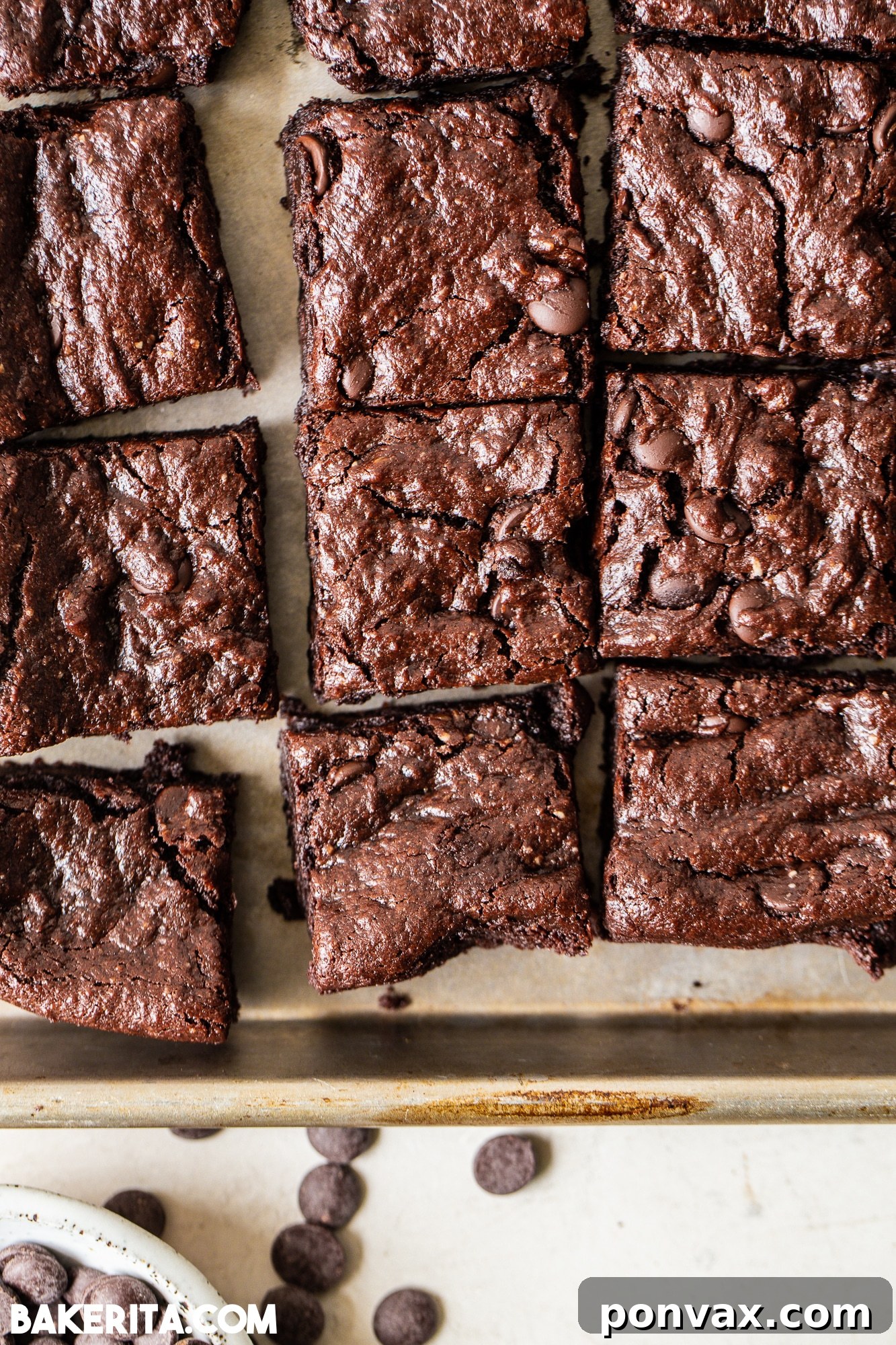 Ultimate Fudgy Vegan Gluten-Free Brownies 3 Close-up of a stack of fresh vegan gluten-free brownies, showcasing their fudgy texture.