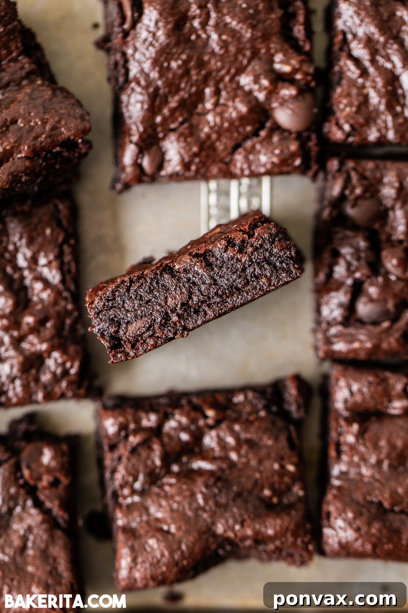 Ultimate Fudgy Vegan Gluten-Free Brownies 6 Perfectly baked vegan gluten-free brownies, cooling in a pan.