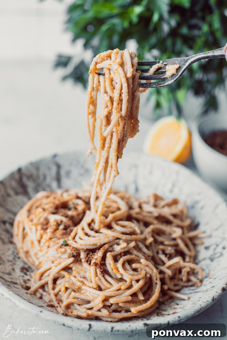 A top-down view of a pan filled with the creamy lemon pasta, ready to be served.