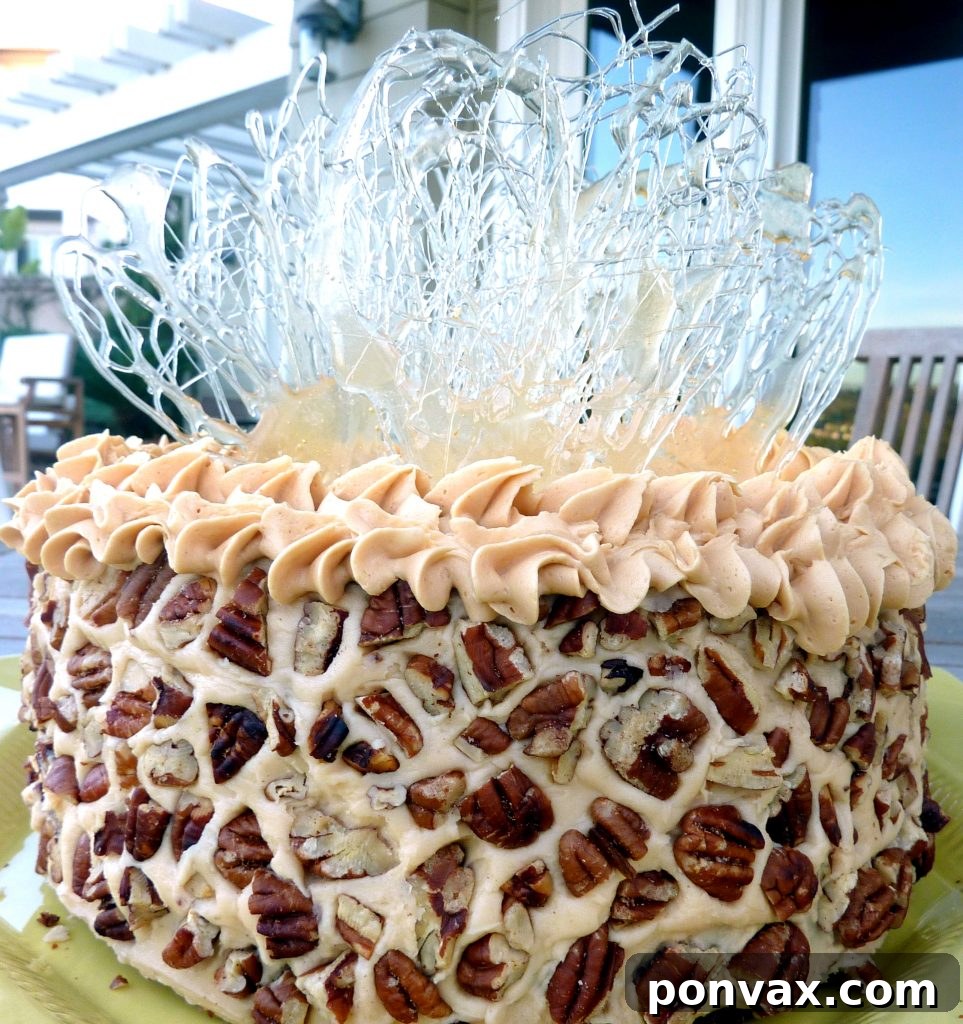 Moist Apple Spice Layer Cake with rich salted caramel buttercream and intricate sugar decorations