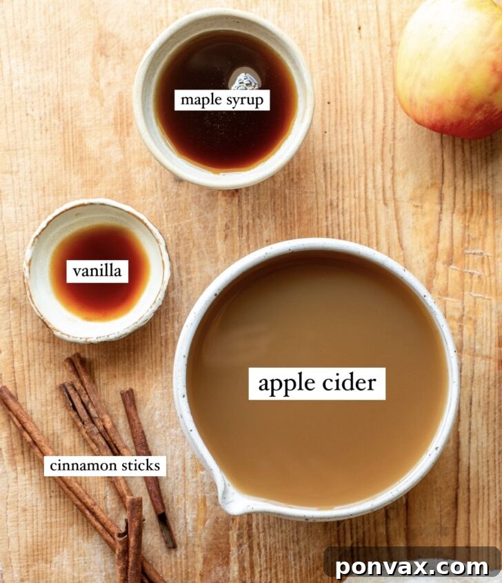 Whip Up Your Own Apple Syrup 2 Ingredients for homemade apple syrup: apple cider, maple syrup, cinnamon sticks, and apple pie spice.
