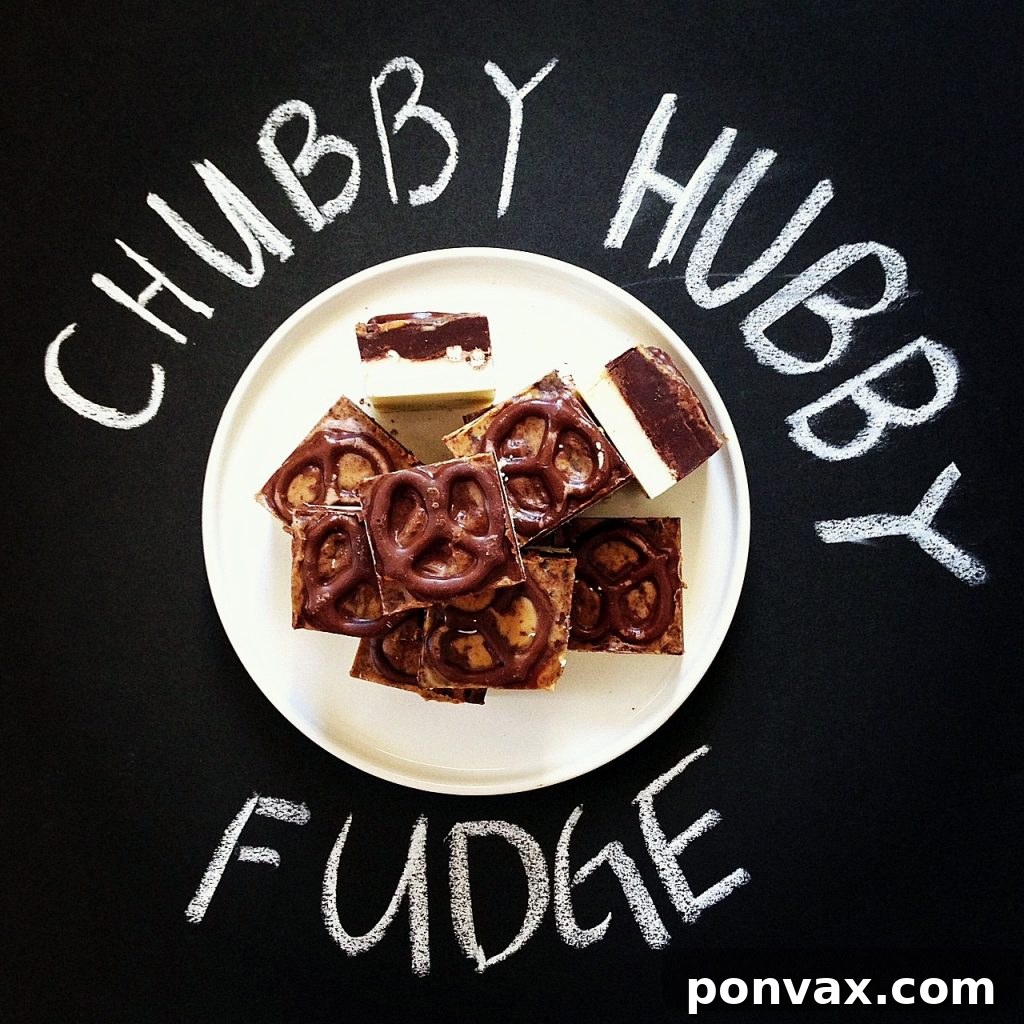 Homemade Chubby Hubby Fudge with layers of vanilla malt and chocolate, peanut butter swirl, and chocolate covered pretzels.