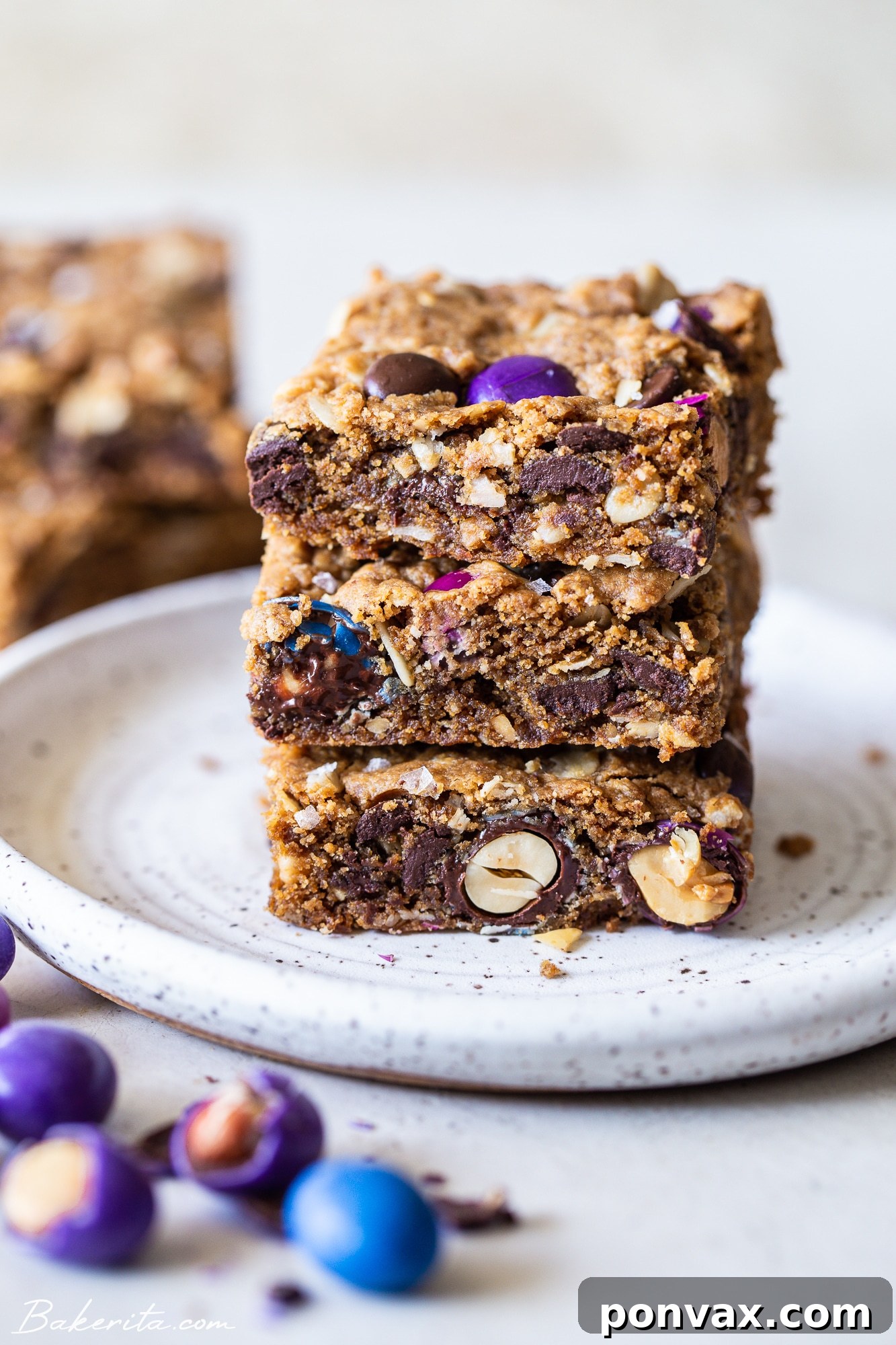 Fully Loaded Vegan Cookie Bars 2 Delicious Vegan Monster Cookie Bars loaded with chocolate and peanut butter candies