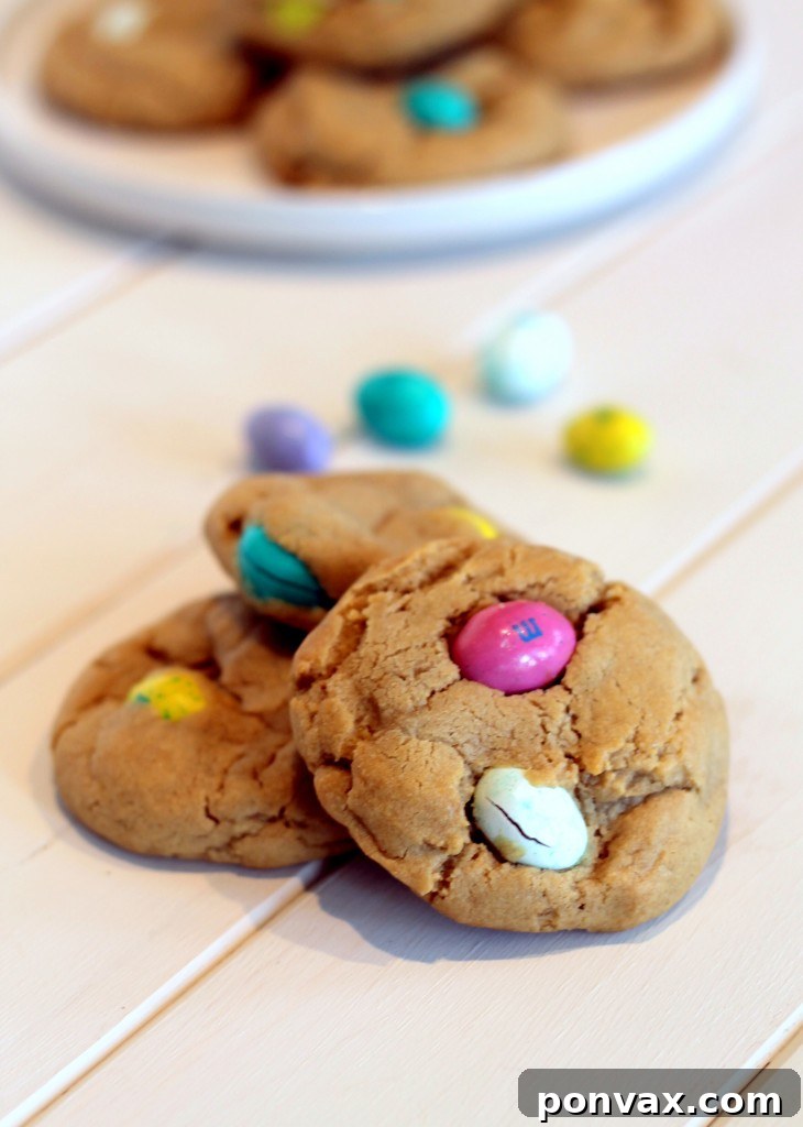 Delicious Soft Peanut Butter M&M Cookies with colorful candy pieces, perfect for a sweet treat.