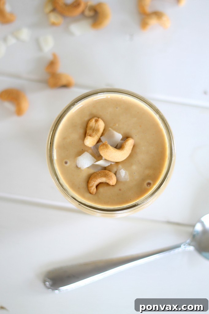 Creamy homemade Coconut Cashew Butter in a jar, ready to be enjoyed.
