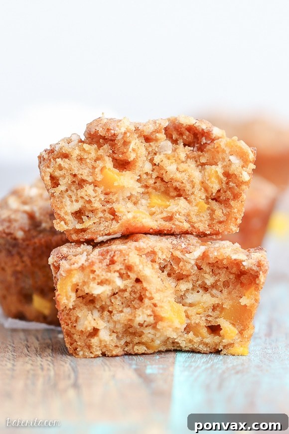 Tropical Mango Coconut Crumble Muffins 4 Overhead view of several Mango Coconut Crumble Muffins, showing texture and ingredients