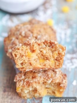 Tropical Mango Coconut Crumble Muffins 8 A plate of delicious Mango Coconut Crumble Muffins