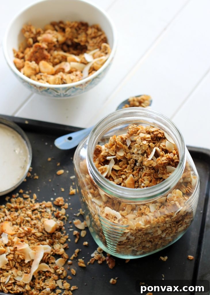Paradise Coconut Macadamia Granola 5 Perfect for a healthy breakfast or snack, this Coconut Macadamia Nut Granola is gluten-free, vegan, and refined sugar-free. Enjoy it with yogurt and berries for a delicious and easy start to your day.