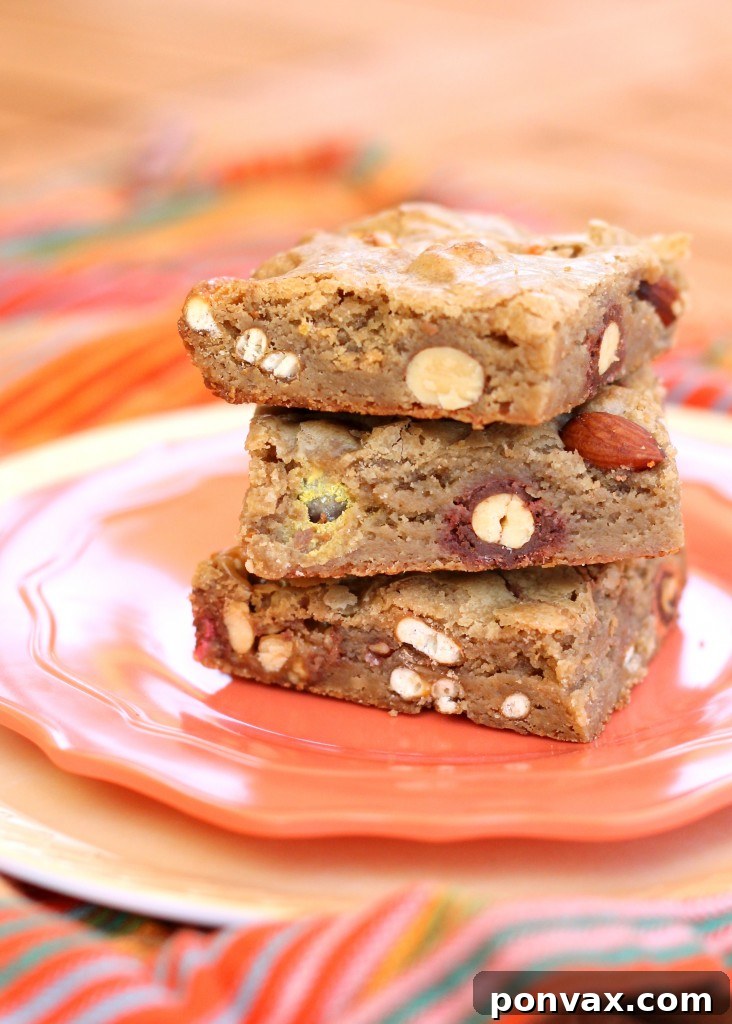 Golden Sweet & Salty Brown Sugar Delights 2 These chewy Sweet & Salty Brown Sugar Bars are full of sweet and salty treats that are perfect for dessert! These are packed with pretzels, almonds, M&Ms, Rolos, and Snickers.
