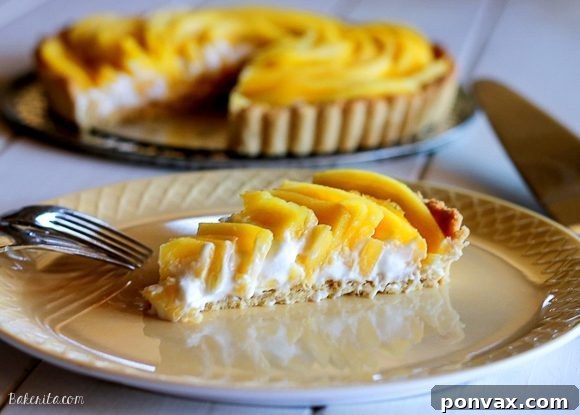 This Mango Tart uses fresh, ripe mangos and coconut cream to make a delicious dessert that's gluten-free, Paleo friendly, refined sugar-free, and vegan! The recipe includes step by step photos for how to make a beautiful mango flower.