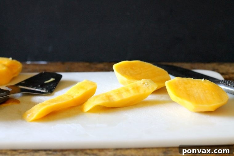 Step-by-step image of how to create thin mango strips for tart decoration