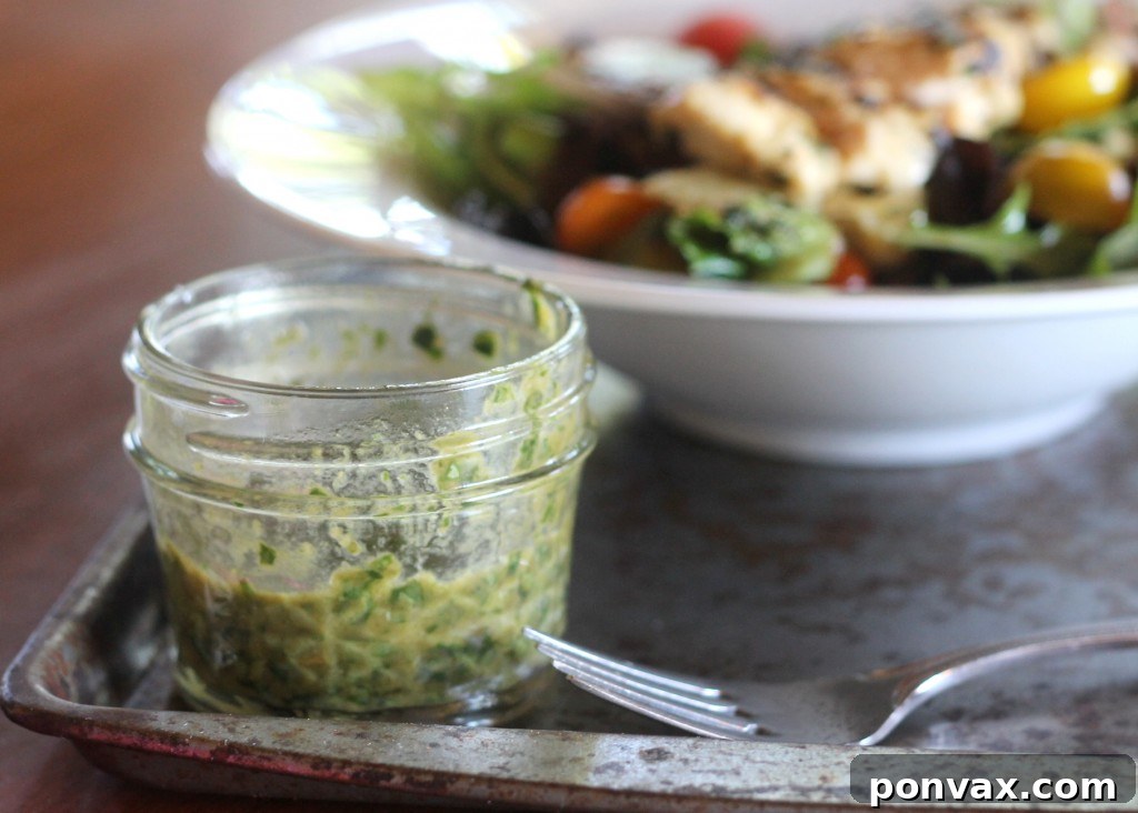 Vibrant Baby Greens with Roasted Garlic Basil Dressing 4 Closeup of the Roasted Garlic Basil Dressing, vibrant green and ready to be used as a marinade or a delicious topping.