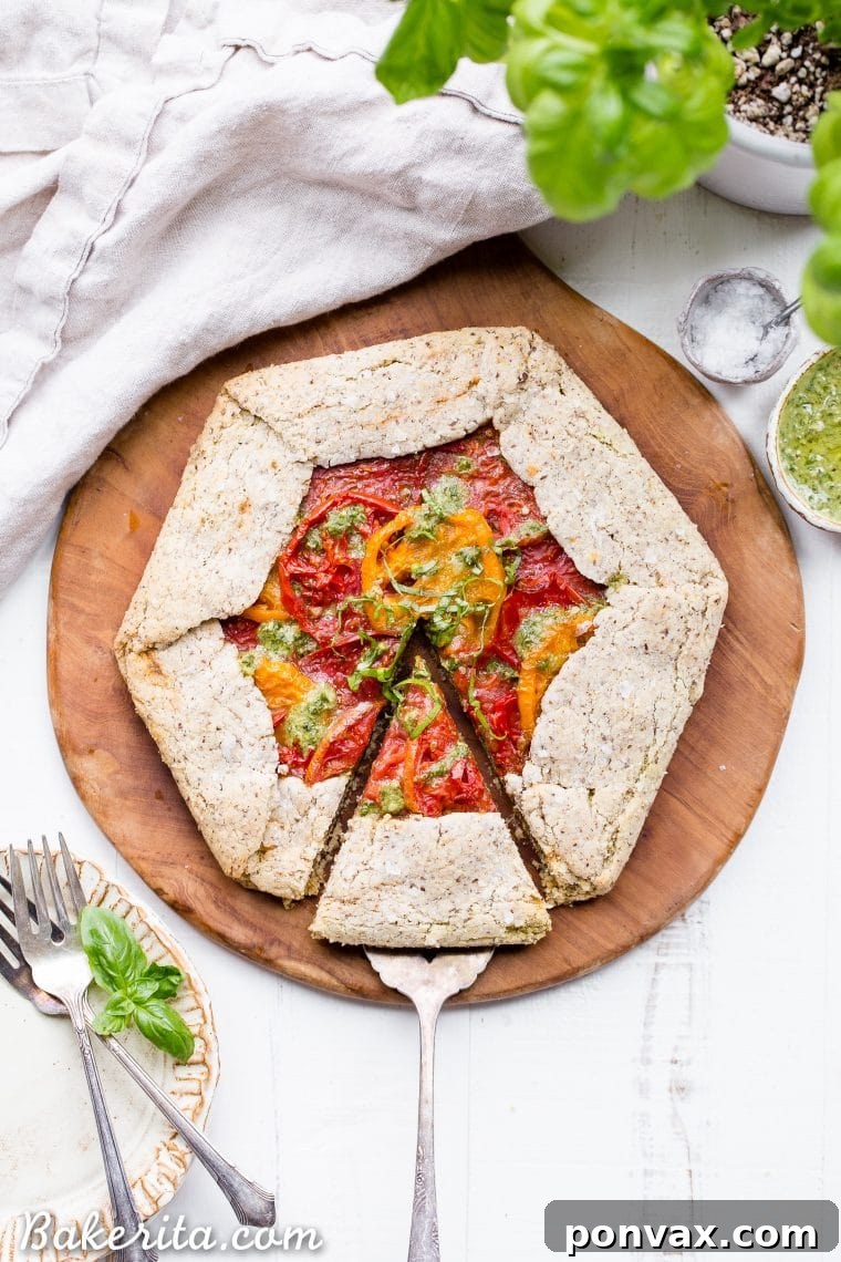 Vibrant Baby Greens with Roasted Garlic Basil Dressing 8 Pesto and Heirloom Tomato Galette with an incredibly flaky, savory crust, a delicious gluten-free, paleo, and vegan appetizer.