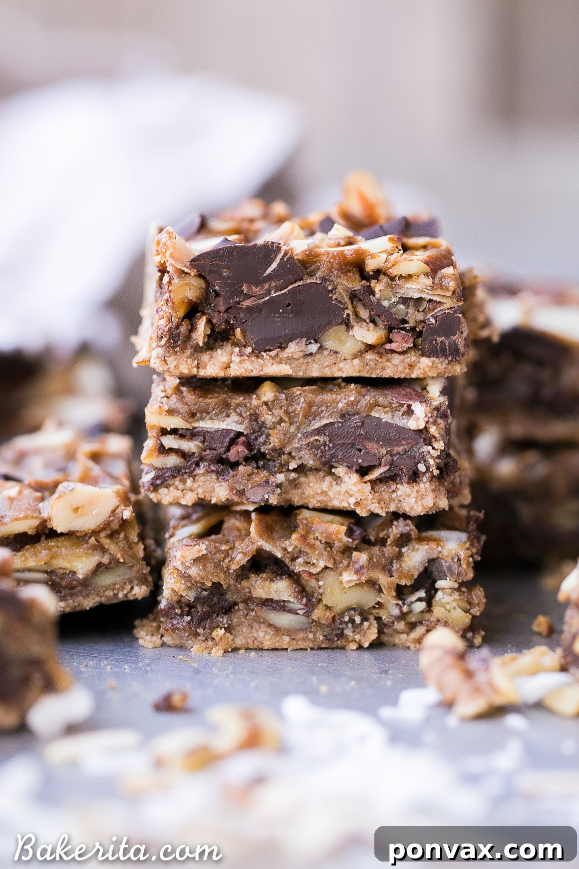 Gluten Free Vegan Paleo Magic Cookie Bars 6 Stack of Paleo Magic Cookie Bars on a plate, ready to be served