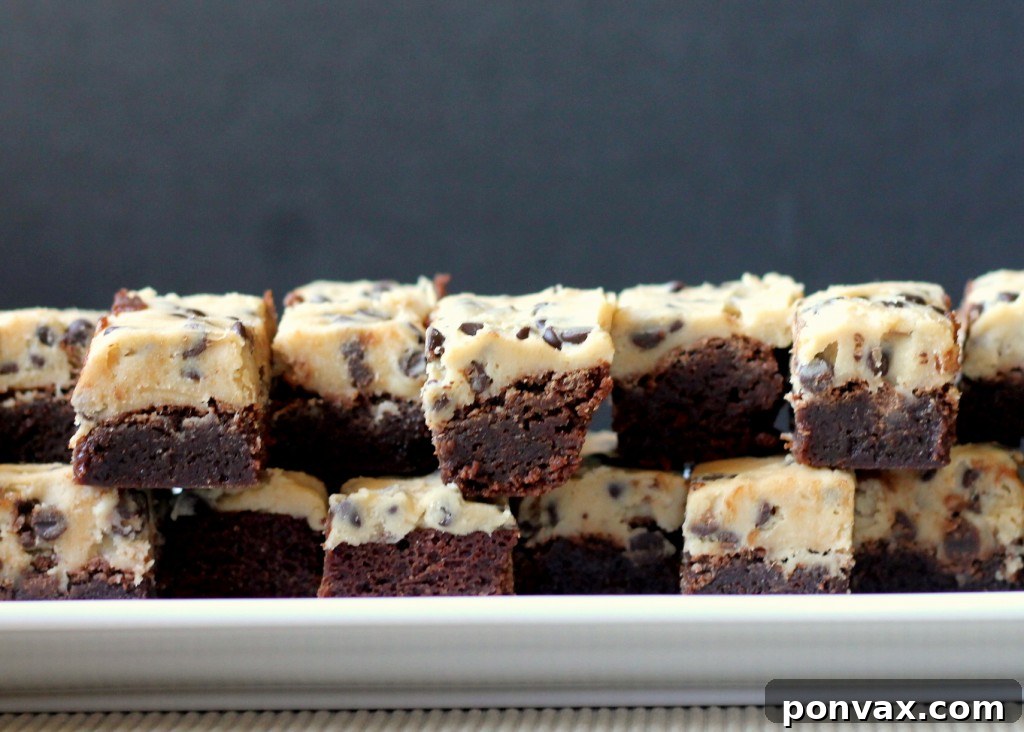 Rich, chewy chocolate brownie topped with eggless mini chocolate chip-filled cookie dough in a Cookie Dough Brownie