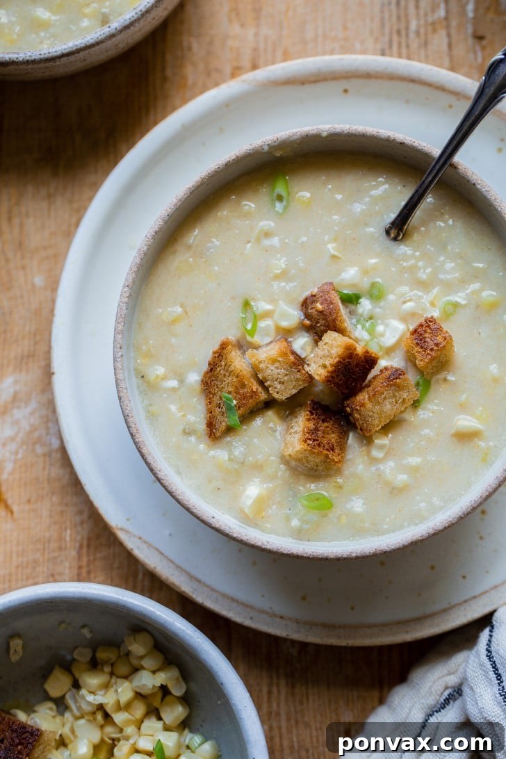 Golden Vegan Corn Chowder 6 Ingredients for Vegan Corn Chowder laid out on a table.