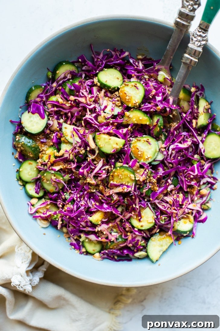 Crispy Cabbage Cucumber Salad with Miso Sesame Dressing, perfect for a light meal or side dish.