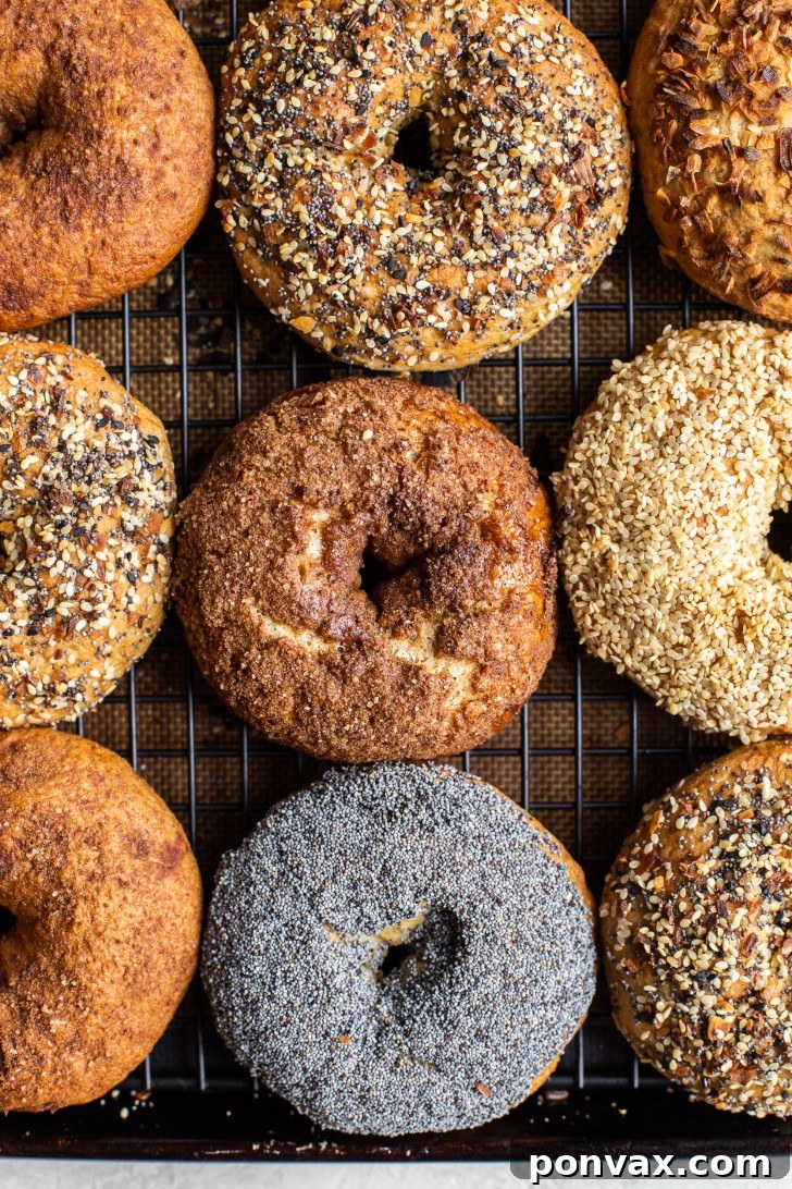 Close-up of golden brown gluten-free bagels, showcasing their perfectly chewy crust.