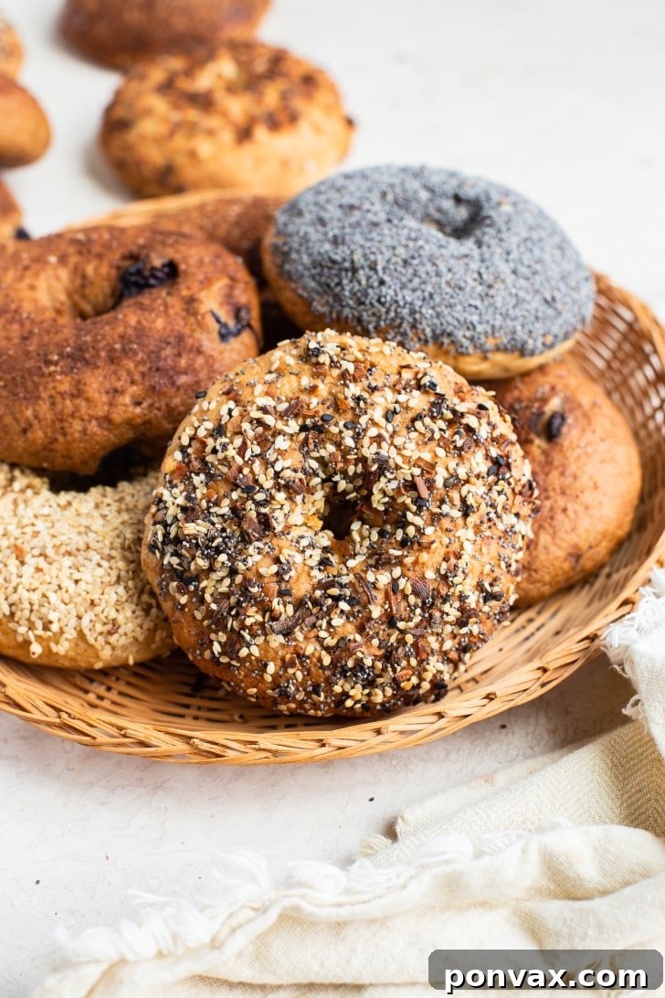 Various gluten-free bagels displayed, some with everything seasoning, some plain.
