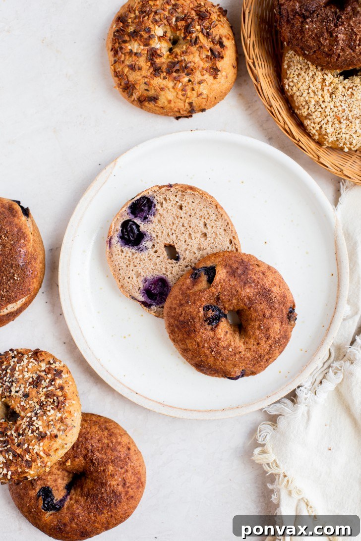 Gluten-free bagels sliced in half and ready to be toasted or spread with toppings.