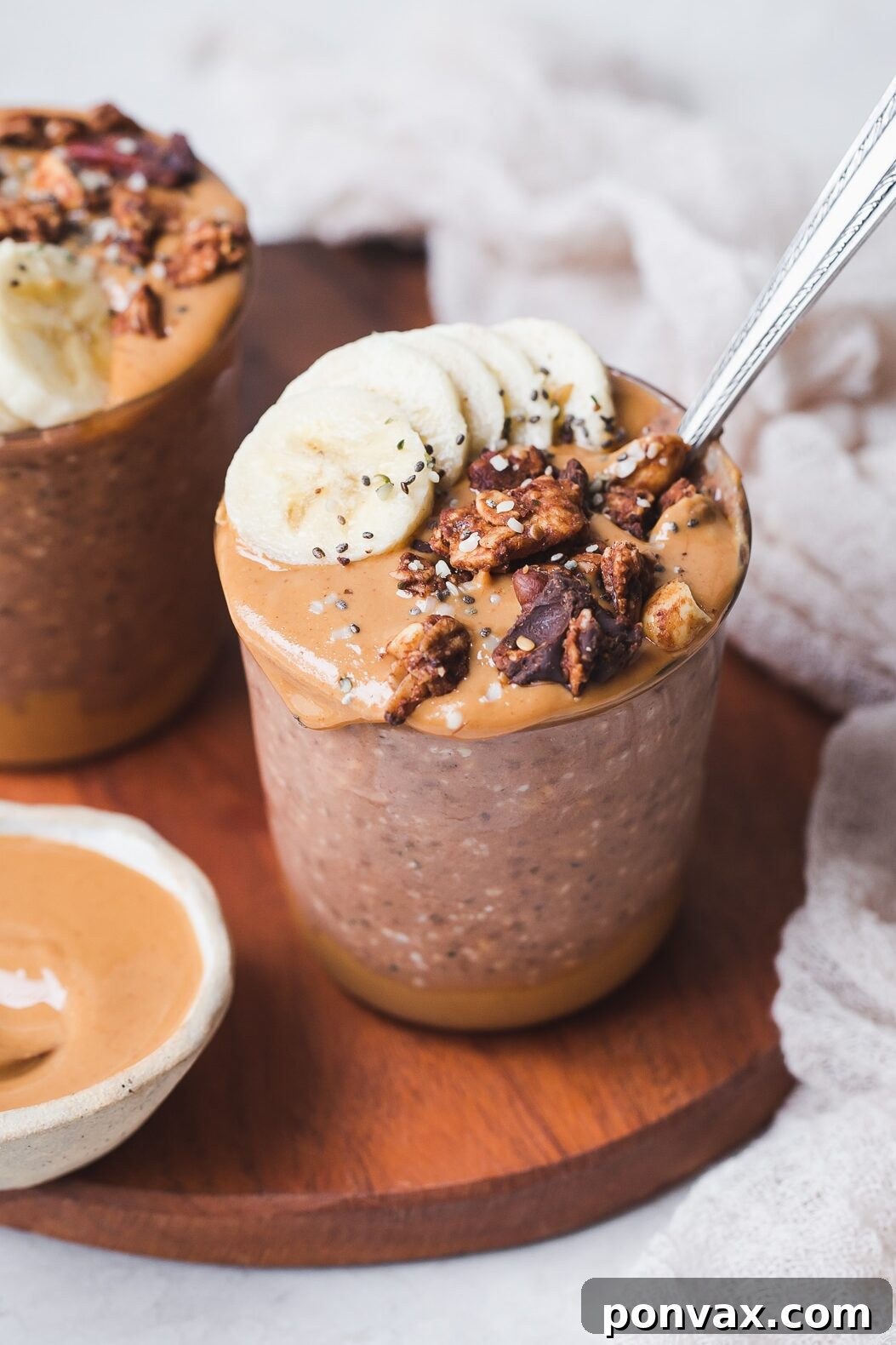 Make breakfast better with this Chocolate Peanut Butter Overnight Oats recipe! Gluten-free, vegan, and made in just 5 minutes, this is an easy make-ahead breakfast you'll make all the time.
