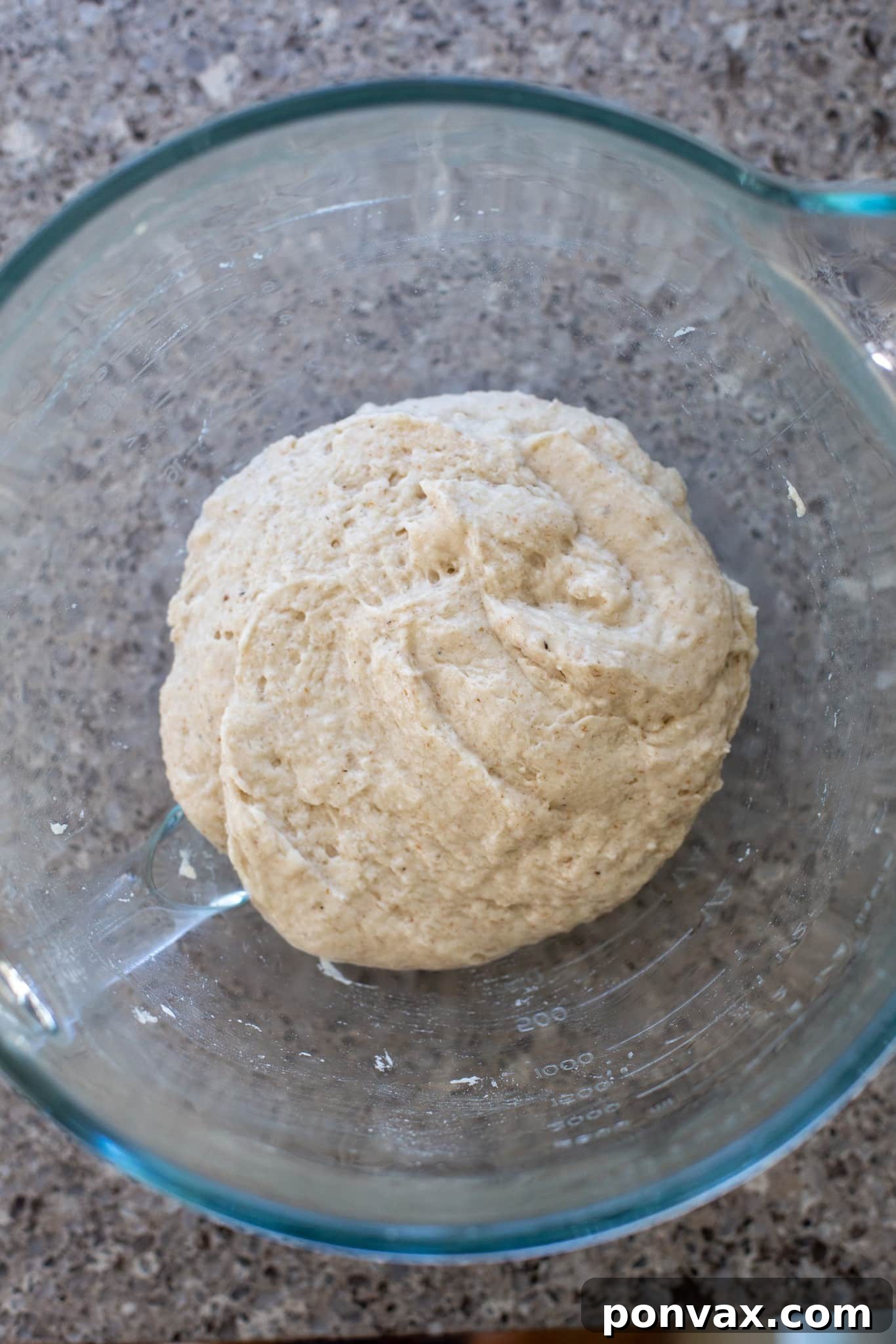Effortless Gluten-Free Focaccia 9 Spreading the dough into an oiled baking pan.
