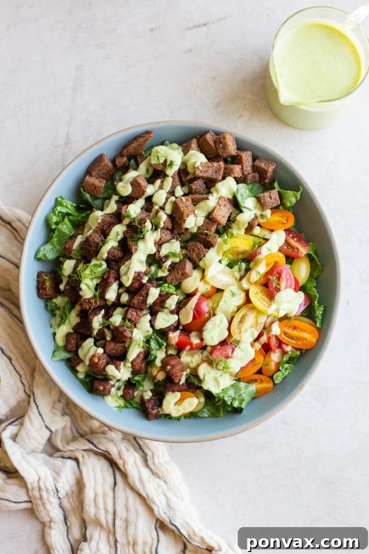 Plant-Based BLT Salad with Creamy Avocado Ranch 2 A vibrant Vegan BLT Salad with avocado ranch dressing, showing crispy tempeh bacon, toasted bread, tomatoes, and romaine.