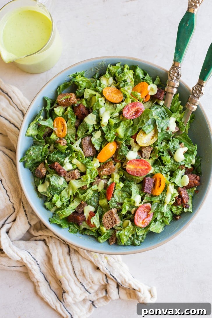 Plant-Based BLT Salad with Creamy Avocado Ranch 3 Close-up of the Vegan BLT Salad showcasing the textures of tempeh bacon, bread, and fresh greens.