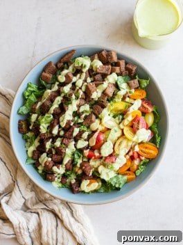 Vegan BLT Salad with Avocado Ranch Dressing in a serving bowl.