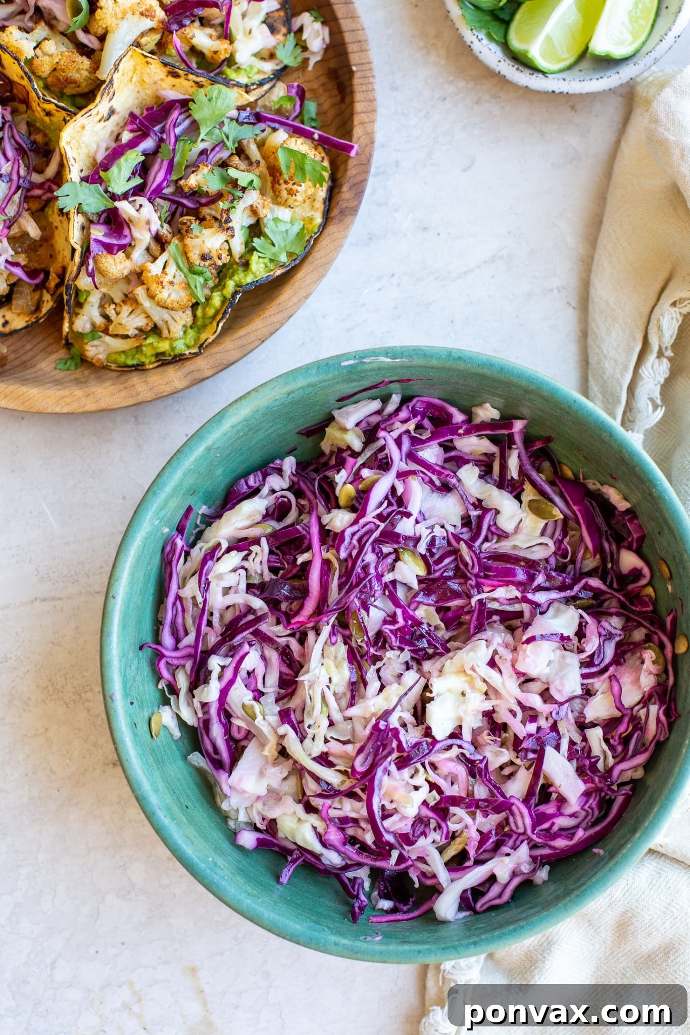 Zesty Roasted Cauliflower Tacos with Tangy Cabbage Slaw 4 A bowl of fresh, vibrant cabbage slaw with pepitas, ready for tacos.