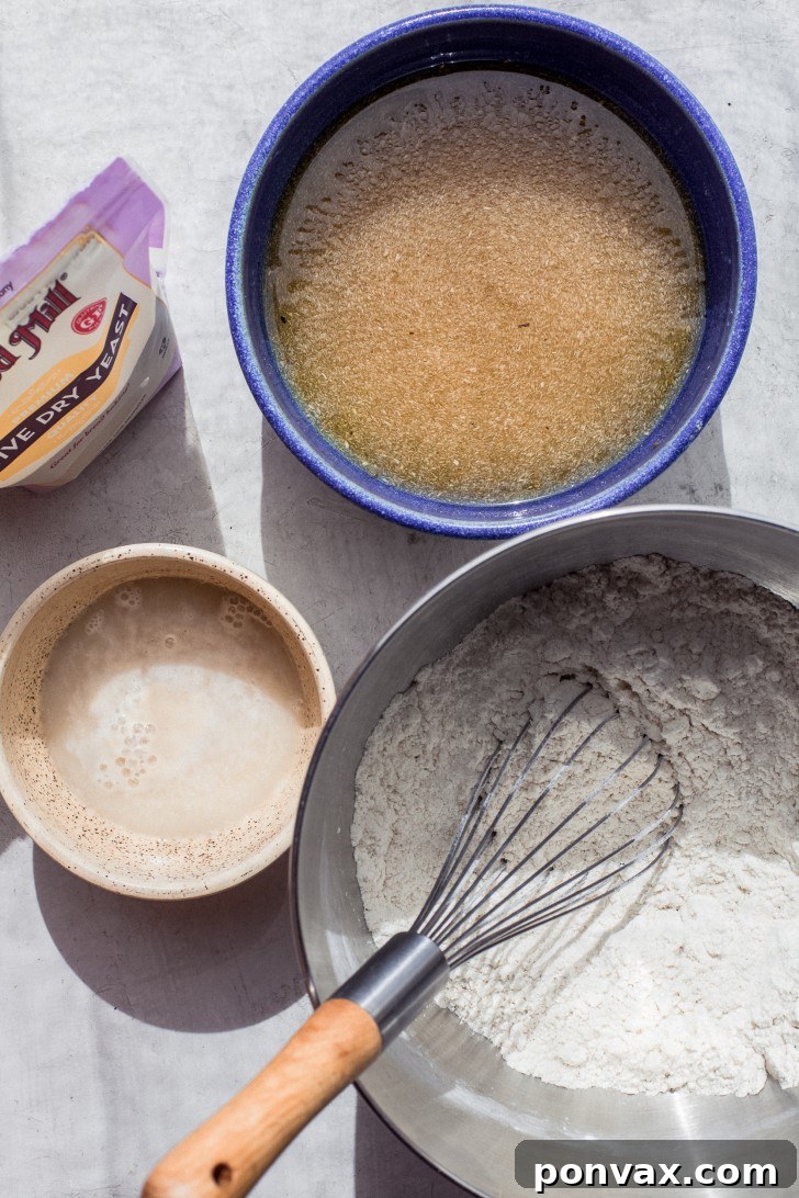 Psyllium Husk The Gluten-Free Binder Demystified 3 Activated yeast, psyllium husk gel in a blue bowl, and a gluten-free flour blend, arranged as key ingredients for a gluten-free bread recipe.