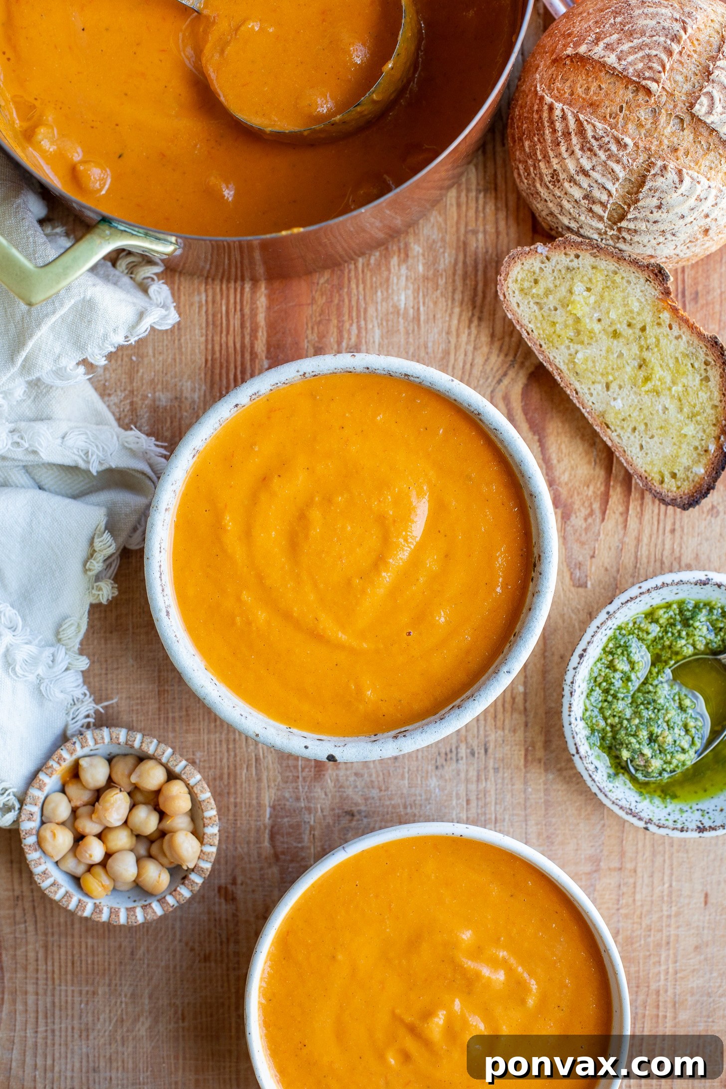 Sun Kissed Roasted Tomato and Chickpea Comfort 4 A rustic bowl of wholesome roasted tomato chickpea soup, perfectly garnished and ready to be enjoyed.