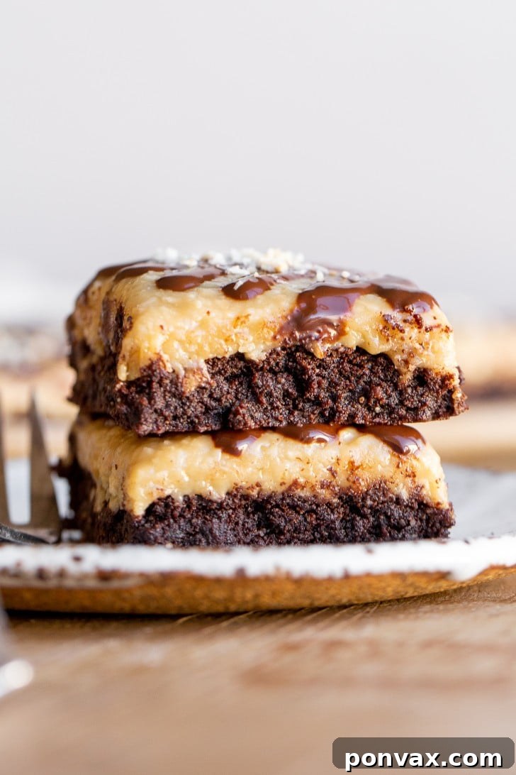 Decadent Gluten-Free Coconut Caramel Brownies 2 Fudgy Gluten-Free Coconut Caramel Brownies with a rich coconut caramel topping and chocolate drizzle, inspired by Samoa cookies.