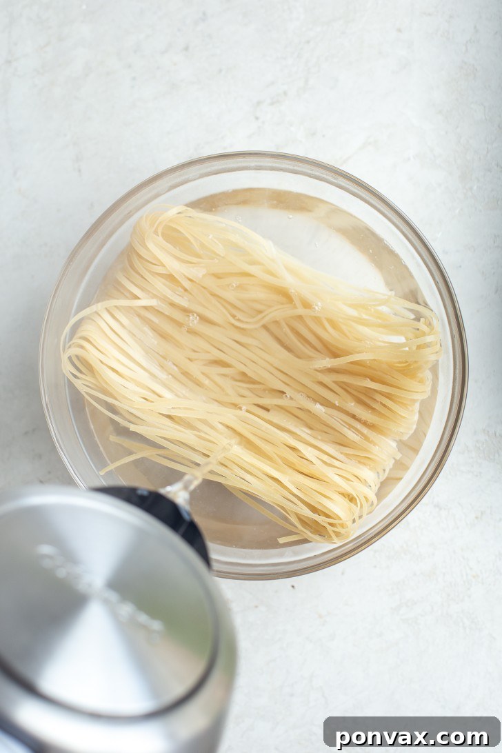 Velvety Peanut Noodles in 5 Minutes 5 Dry rice noodles in a bowl.