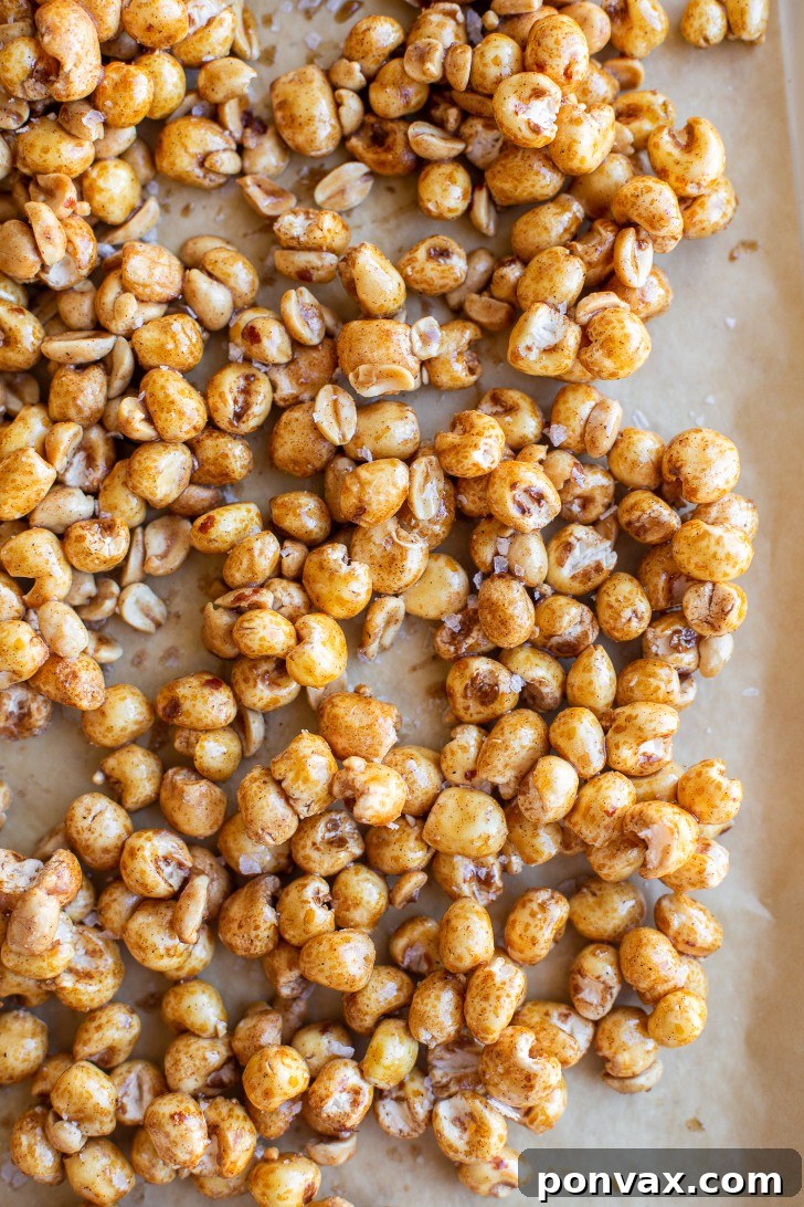 Close-up of Maple Peanut Puffed Corn showing the glaze and peanuts