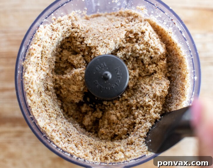 Hazelnuts forming a paste in the food processor