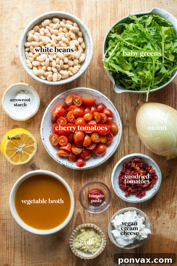 Velvety Tomato and Cannellini Stew 4 Ingredients for the stew laid out on a kitchen counter.