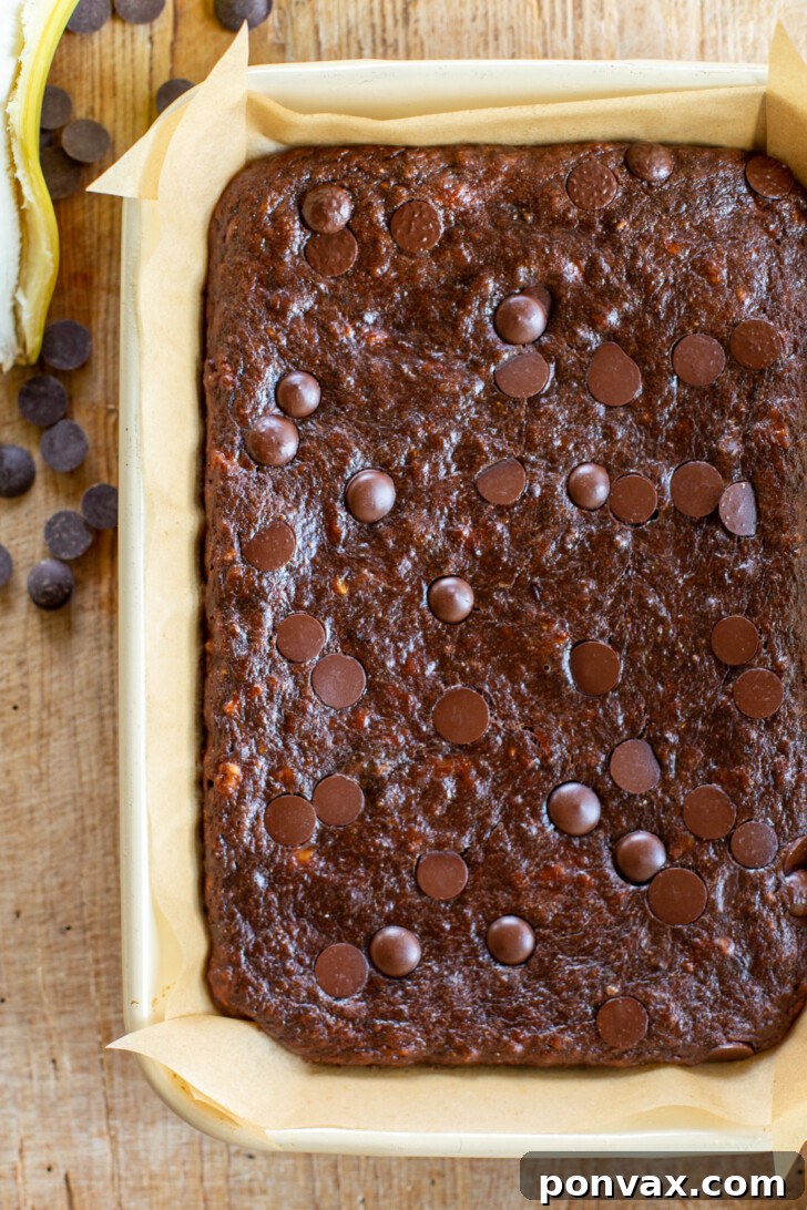Freshly baked Vegan Flourless Banana Brownies in a pan, still warm from the oven.