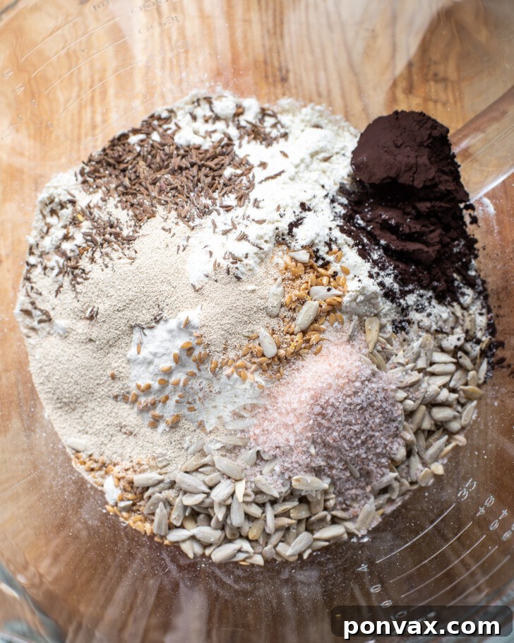 Step 1: Psyllium husk, date syrup, and hot water being whisked in a bowl to form a gel.