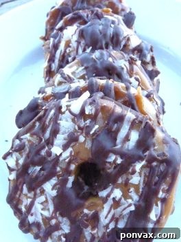 An overhead shot of finished homemade Samoas (Caramel Delites) cookies, ready to be enjoyed.