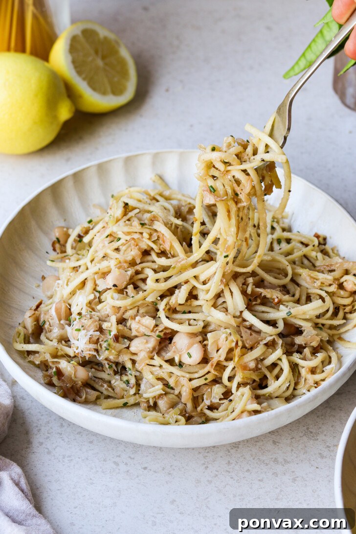 A closer view of the Caramelized Cabbage Pasta, garnished with fresh herbs and demonstrating the perfect blend of ingredients, ready to be served.
