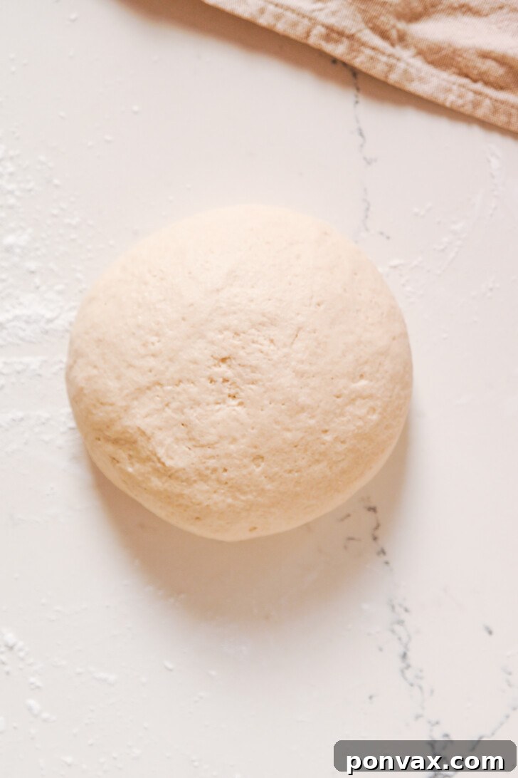 Step 4: Coating the dough with olive oil before the bulk fermentation.
