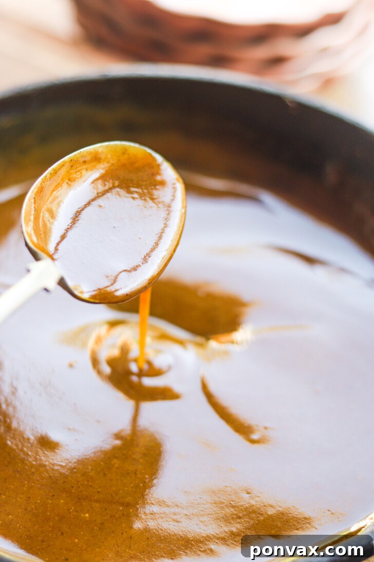 Step 4: Syrup simmering on the stove, achieving desired consistency.