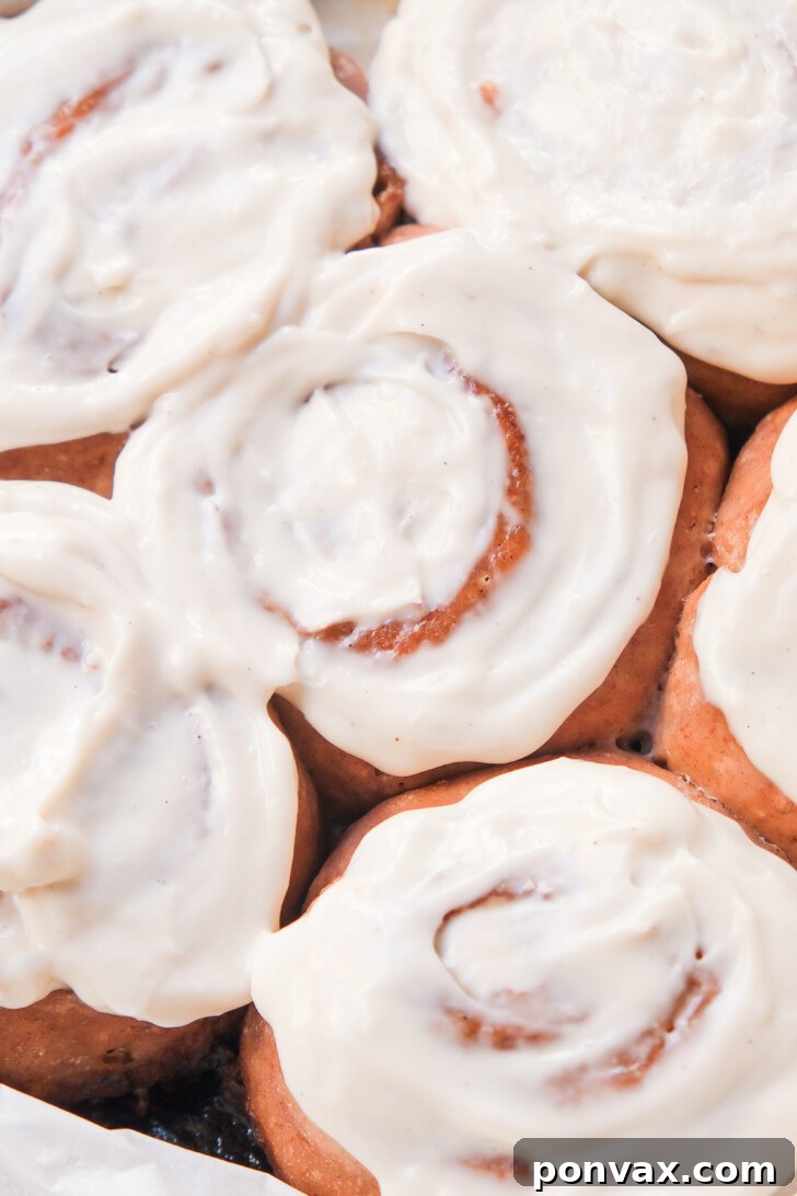 Irresistible Gluten-Free Sourdough Cinnamon Buns 20 Glazed gluten-free sourdough cinnamon rolls ready to be enjoyed.