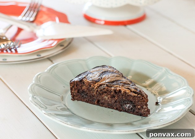 Moist and flavorful Banana Cocoa Cake, a Paleo and gluten-free breakfast option.